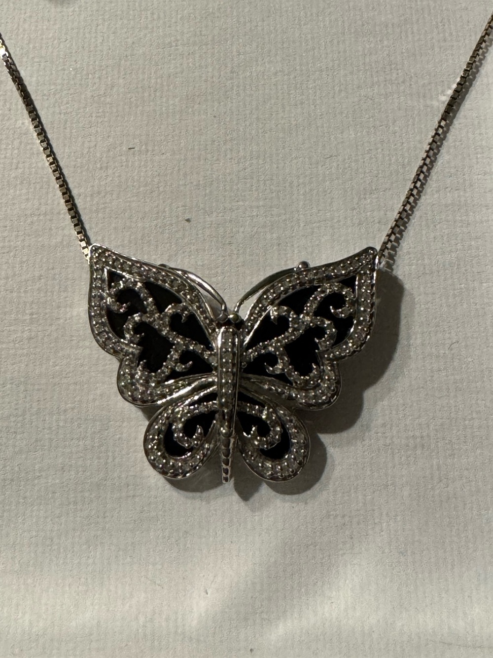 Silver Butterfly Necklace with Black Accents